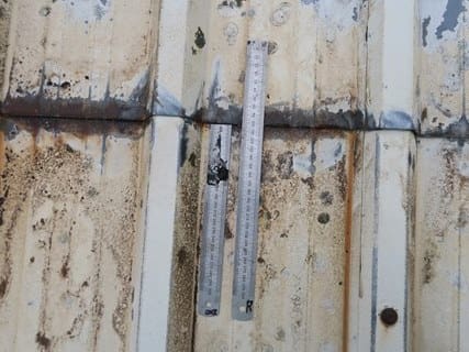 images showing the testing to see if a butyl sealing strip is present on a metal profiled roof.